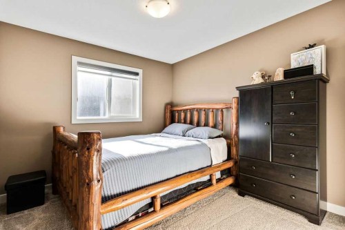 205 Aspenmere Way, Chestermere, AB - Indoor Photo Showing Bedroom