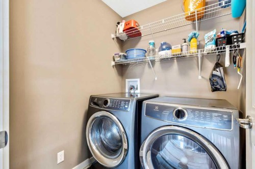 205 Aspenmere Way, Chestermere, AB - Indoor Photo Showing Laundry Room