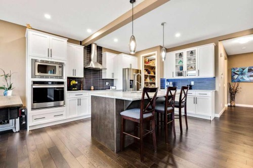 205 Aspenmere Way, Chestermere, AB - Indoor Photo Showing Kitchen With Upgraded Kitchen