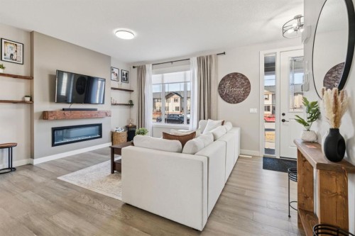 512 River Avenue, Cochrane, AB - Indoor Photo Showing Living Room With Fireplace
