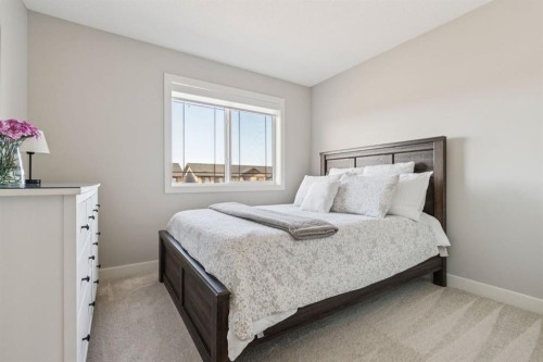 512 River Avenue, Cochrane, AB - Indoor Photo Showing Bedroom