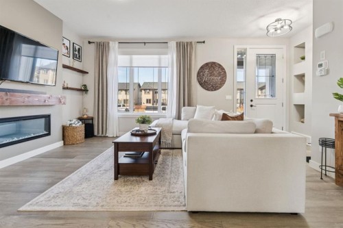 512 River Avenue, Cochrane, AB - Indoor Photo Showing Living Room With Fireplace