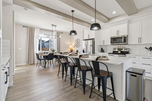 512 River Avenue, Cochrane, AB - Indoor Photo Showing Kitchen With Upgraded Kitchen