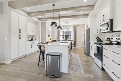 512 River Avenue, Cochrane, AB - Indoor Photo Showing Kitchen With Upgraded Kitchen
