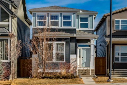 730 Belmont Drive Sw, Calgary, AB - Outdoor With Facade