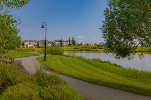 730 Belmont Drive Sw, Calgary, AB - Outdoor With Body Of Water With View
