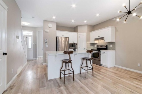 730 Belmont Drive Sw, Calgary, AB - Indoor Photo Showing Kitchen With Upgraded Kitchen