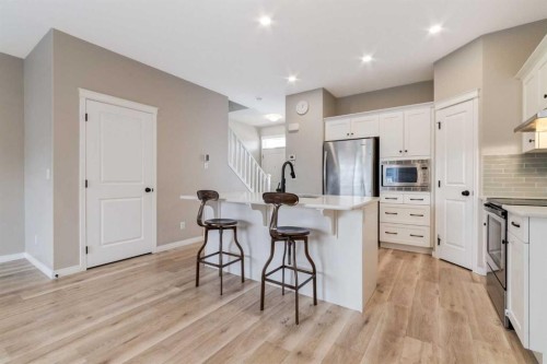 730 Belmont Drive Sw, Calgary, AB - Indoor Photo Showing Kitchen With Upgraded Kitchen