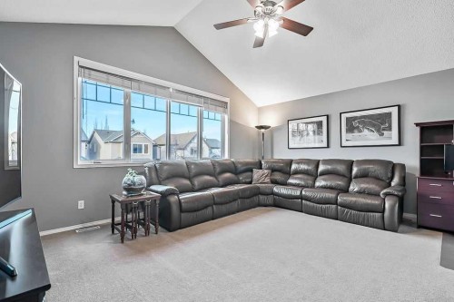 115 Cougarstone Square Sw, Calgary, AB - Indoor Photo Showing Living Room