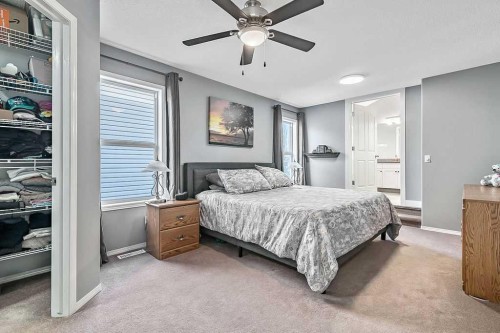 115 Cougarstone Square Sw, Calgary, AB - Indoor Photo Showing Bedroom