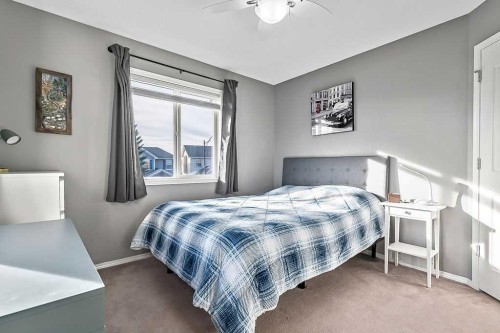 115 Cougarstone Square Sw, Calgary, AB - Indoor Photo Showing Bedroom