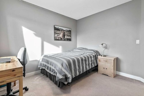 115 Cougarstone Square Sw, Calgary, AB - Indoor Photo Showing Bedroom