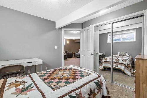 115 Cougarstone Square Sw, Calgary, AB - Indoor Photo Showing Bedroom