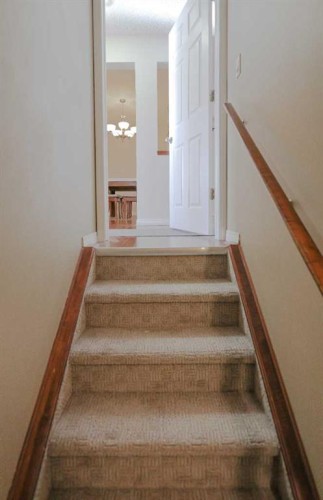 125 Silverado Range Cove Sw, Calgary, AB - Indoor Photo Showing Other Room