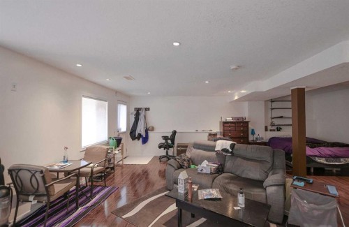 125 Silverado Range Cove Sw, Calgary, AB - Indoor Photo Showing Living Room