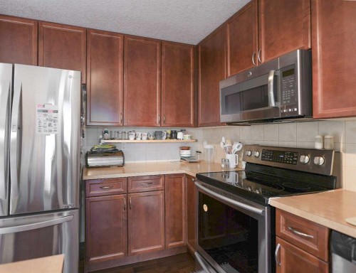 125 Silverado Range Cove Sw, Calgary, AB - Indoor Photo Showing Kitchen