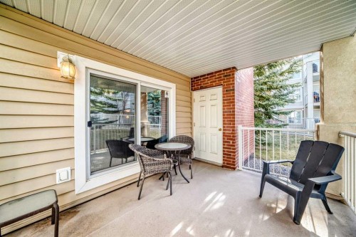116-6800 Hunterview Drive Nw, Calgary, AB - Outdoor With Deck Patio Veranda With Exterior
