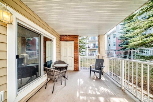 116-6800 Hunterview Drive Nw, Calgary, AB - Outdoor With Deck Patio Veranda With Exterior