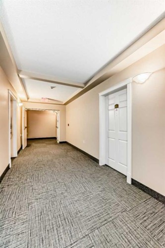 116-6800 Hunterview Drive Nw, Calgary, AB - Indoor Photo Showing Other Room