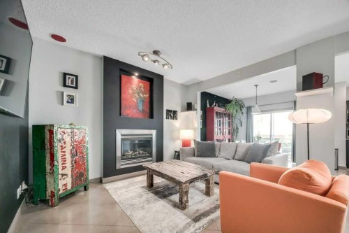 26 Copperfield Common Se, Calgary, AB - Indoor Photo Showing Living Room With Fireplace