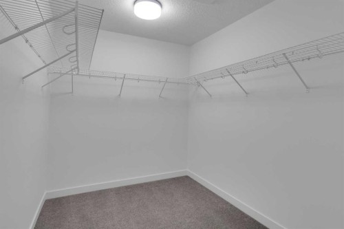137 Copperhead Road Se, Calgary, AB - Indoor With Storage