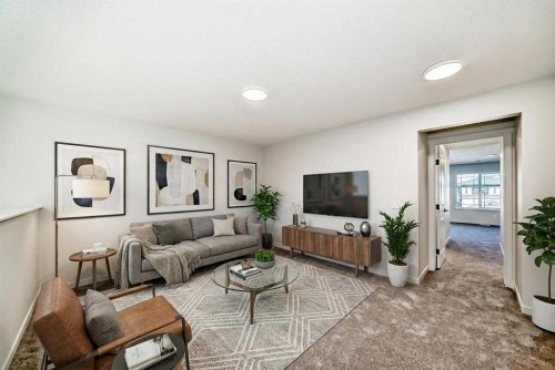 107 Mercado Crescent Se, Calgary, AB - Indoor Photo Showing Living Room