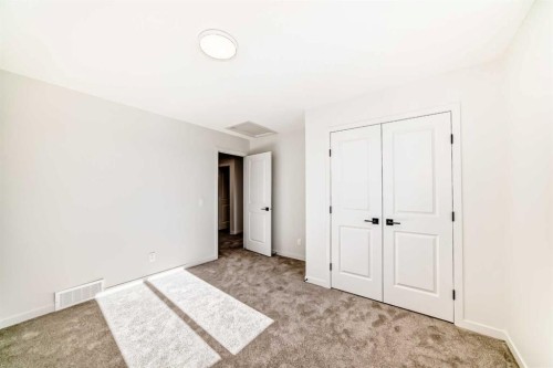 107 Mercado Crescent Se, Calgary, AB - Indoor Photo Showing Other Room
