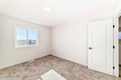 107 Mercado Crescent Se, Calgary, AB - Indoor Photo Showing Other Room