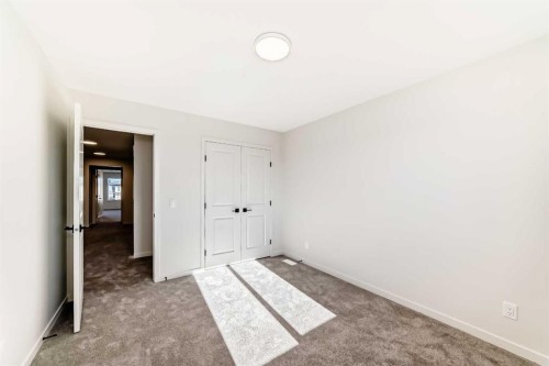 107 Mercado Crescent Se, Calgary, AB - Indoor Photo Showing Other Room