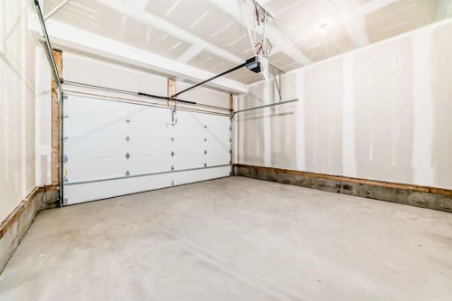 107 Mercado Crescent Se, Calgary, AB - Indoor Photo Showing Garage