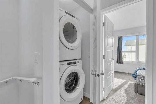 363-301 Redstone Boulevard Ne, Calgary, AB - Indoor Photo Showing Laundry Room