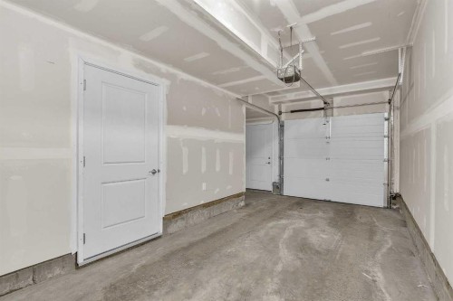 363-301 Redstone Boulevard Ne, Calgary, AB - Indoor Photo Showing Garage