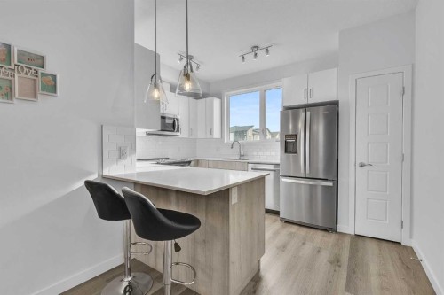 363-301 Redstone Boulevard Ne, Calgary, AB - Indoor Photo Showing Kitchen With Upgraded Kitchen