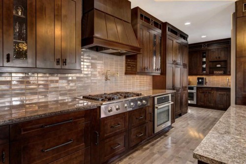 566 Pine Creek Ridge, Heritage Pointe, AB - Indoor Photo Showing Kitchen With Upgraded Kitchen