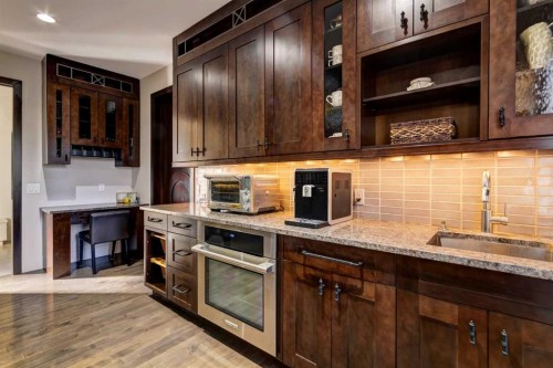 566 Pine Creek Ridge, Heritage Pointe, AB - Indoor Photo Showing Kitchen