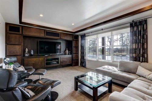 566 Pine Creek Ridge, Heritage Pointe, AB - Indoor Photo Showing Living Room