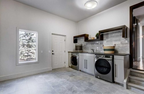 566 Pine Creek Ridge, Heritage Pointe, AB - Indoor Photo Showing Laundry Room