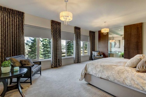 566 Pine Creek Ridge, Heritage Pointe, AB - Indoor Photo Showing Bedroom