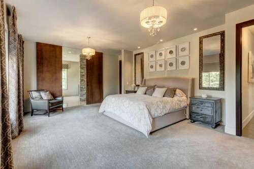 566 Pine Creek Ridge, Heritage Pointe, AB - Indoor Photo Showing Bedroom