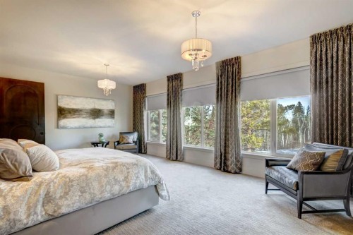 566 Pine Creek Ridge, Heritage Pointe, AB - Indoor Photo Showing Bedroom