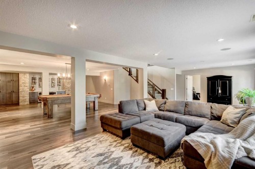 566 Pine Creek Ridge, Heritage Pointe, AB - Indoor Photo Showing Living Room