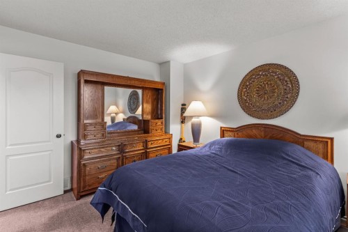7-1017 Olympic Drive, Canmore, AB - Indoor Photo Showing Bedroom