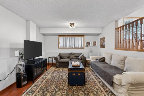 68 Coventry Green Ne, Calgary, AB - Indoor Photo Showing Living Room