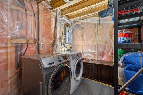 68 Coventry Green Ne, Calgary, AB - Indoor Photo Showing Laundry Room