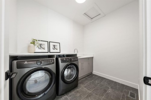 2755 Cannon Road Nw, Calgary, AB - Indoor Photo Showing Laundry Room