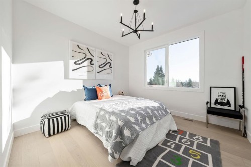 2755 Cannon Road Nw, Calgary, AB - Indoor Photo Showing Bedroom