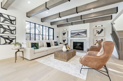 2755 Cannon Road Nw, Calgary, AB - Indoor Photo Showing Other Room With Fireplace