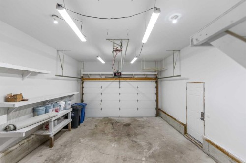 1006 Shantz Place, Crossfield, AB - Indoor Photo Showing Garage