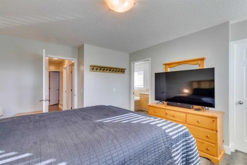 199 Everglen Way Sw, Calgary, AB - Indoor Photo Showing Bedroom