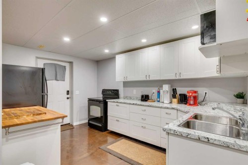 199 Everglen Way Sw, Calgary, AB - Indoor Photo Showing Kitchen With Double Sink
